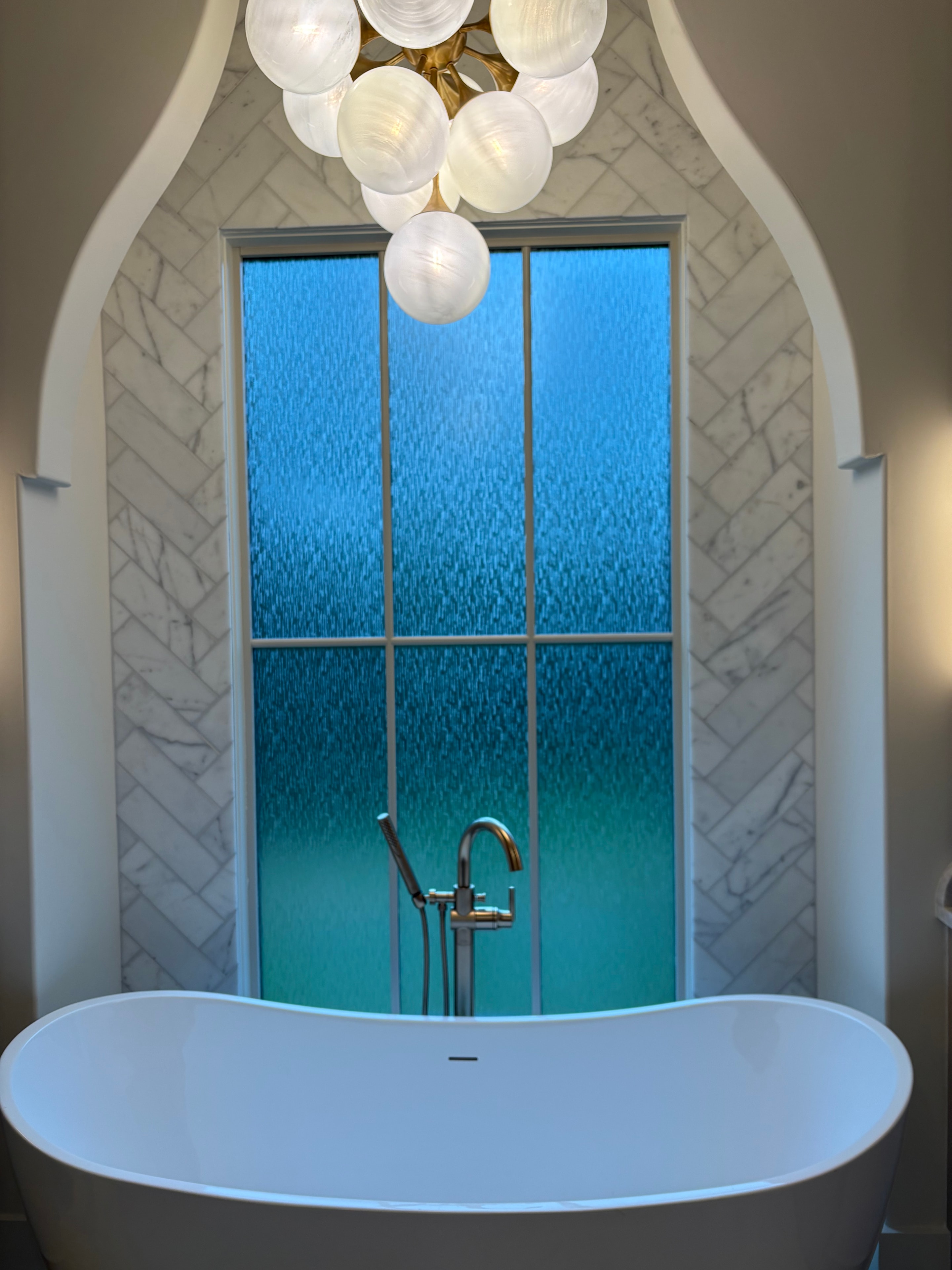 Luxury bath window after SXHE-1034 Ice Forest decorative film — stunning teal privacy film installed