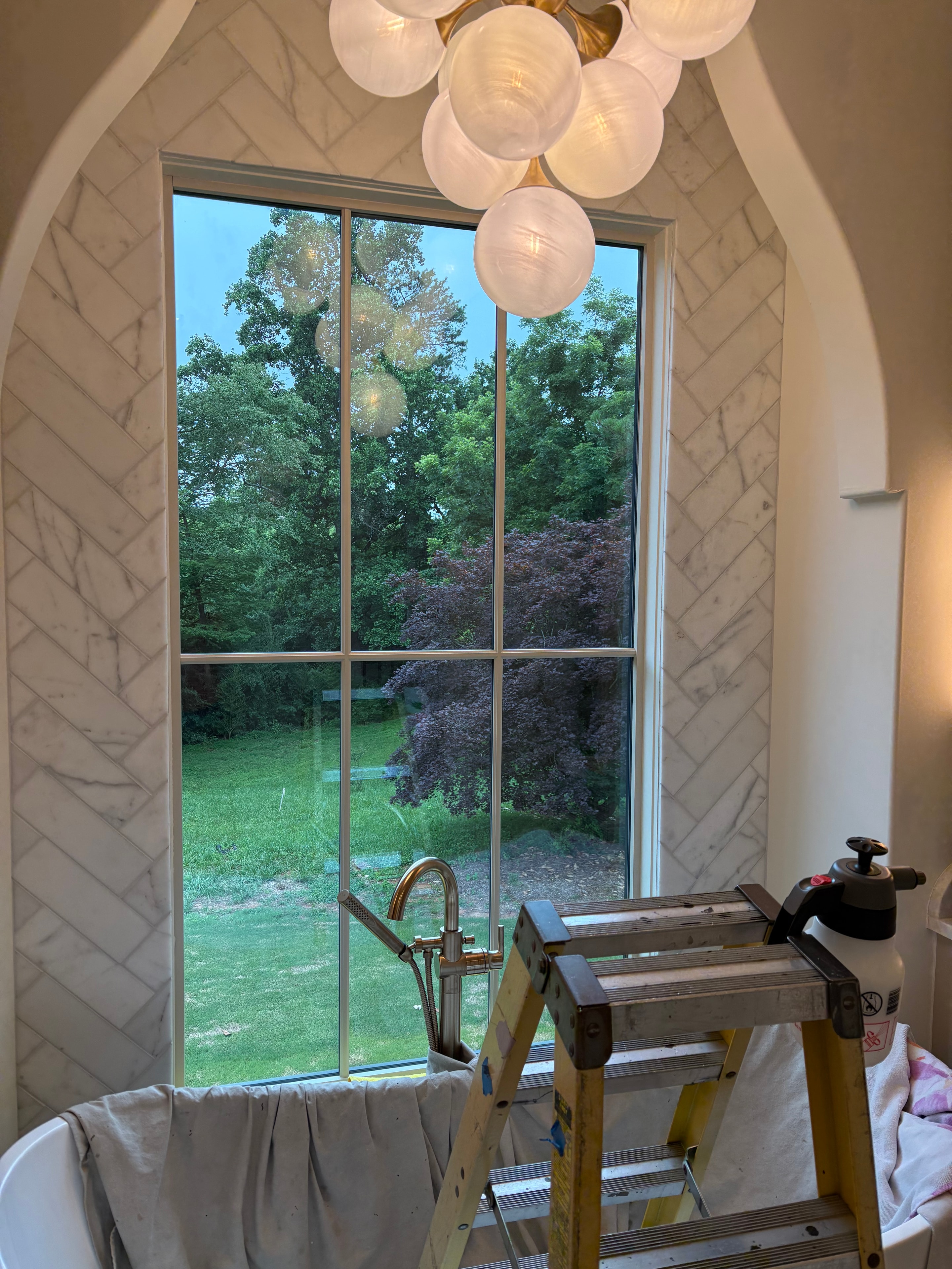 Luxury bath window before SXHE-1034 Ice Forest decorative film — clear glass with garden view