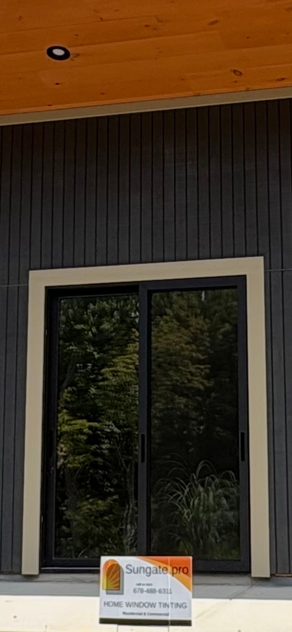 Madico Optivision 25 installed on sliding glass doors at a home in Dahlonega GA by Sungate — daytime privacy, energy control, and glare reduction for TV viewing