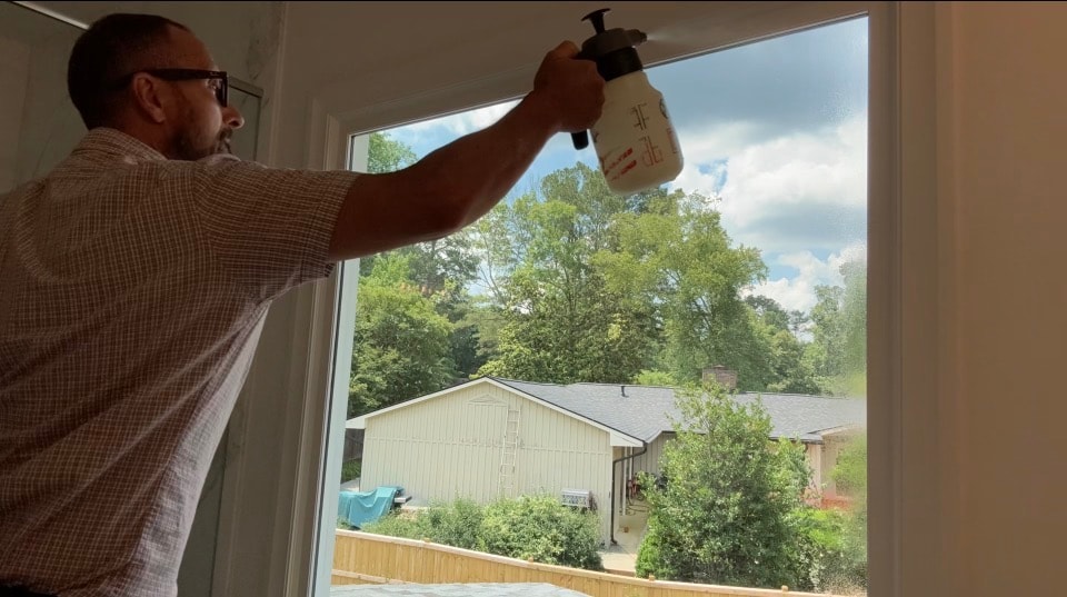 Joe installing Hüper Optik window film