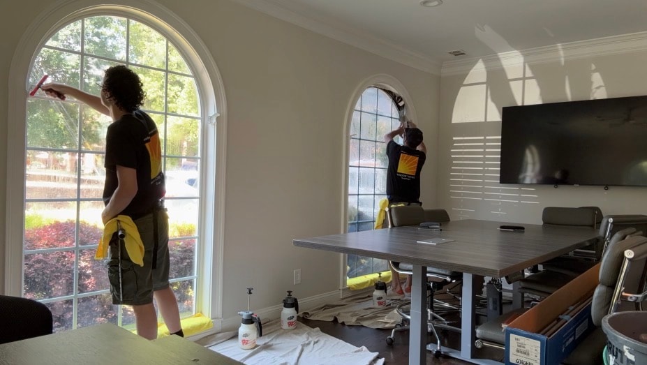 Madico Optivision 5 installed on arched windows at a commercial office building in Roswell GA by Sungate — reducing AC heat gain