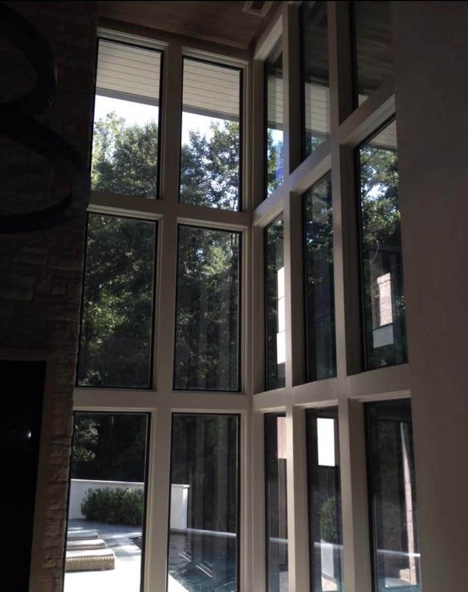 Hüper Optik Ceramic 30 installation on fanlight windows in a modern Buckhead Atlanta mansion