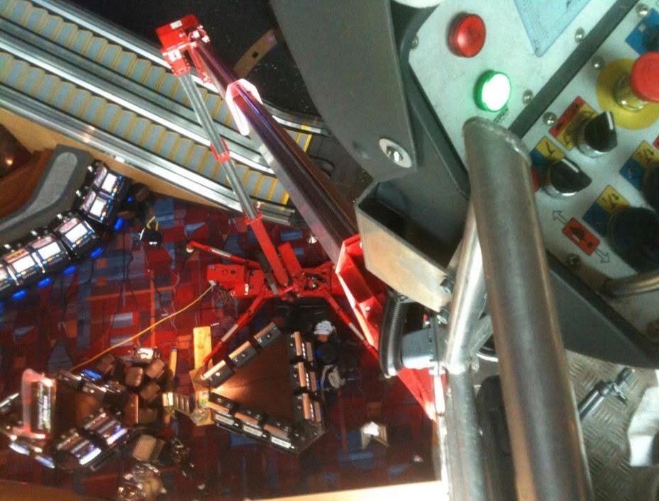 Spider lift controls and aerial view during high-rise window film installation