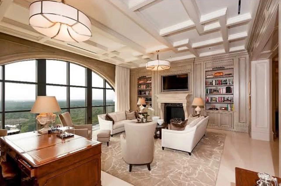 Luxury penthouse living room with arched floor-to-ceiling windows after tinting