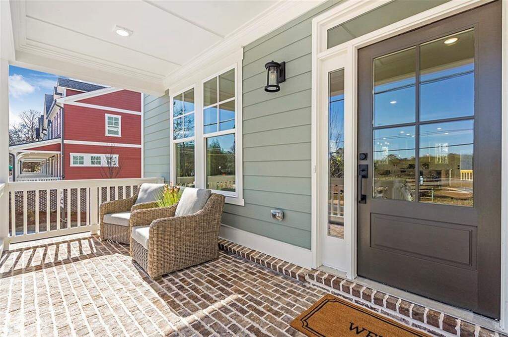 South on Main porch and windows with Hüper Optik Sech film installed by Sungate